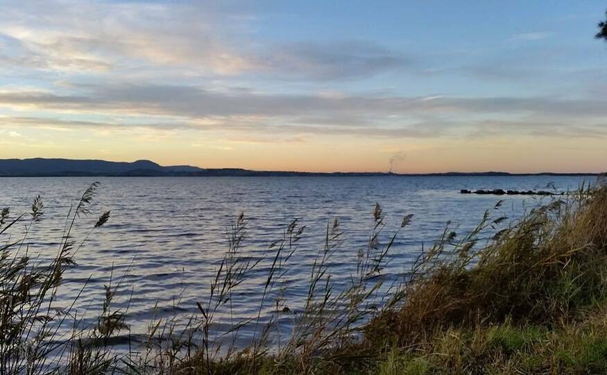 THING OF BEAUTY: Lake Illawarra with Port Kembla in the background by Rylee Cole.  Send your image to letters@illawarramercury.com.au or tag us via @illawarramerc.