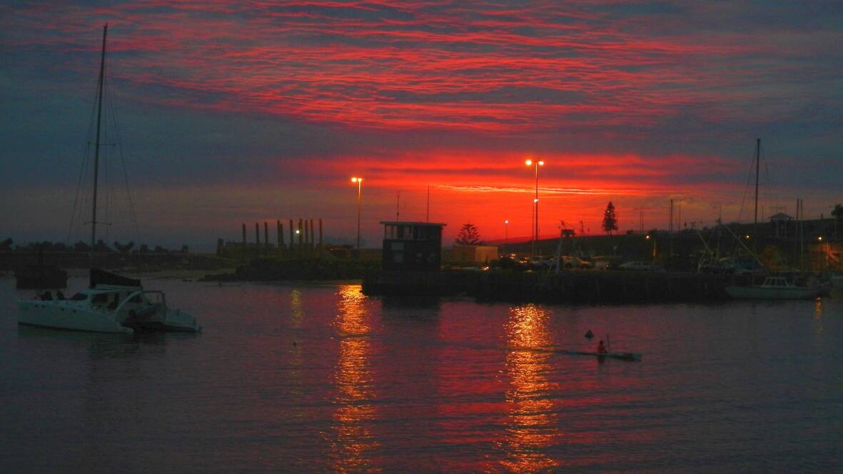EARLY RISER: A dawn paddler at Wollongong Harbour by Hans Haverkamp. Send us your photos to letters@illawarramercury.com.au or post to our Facebook page.
