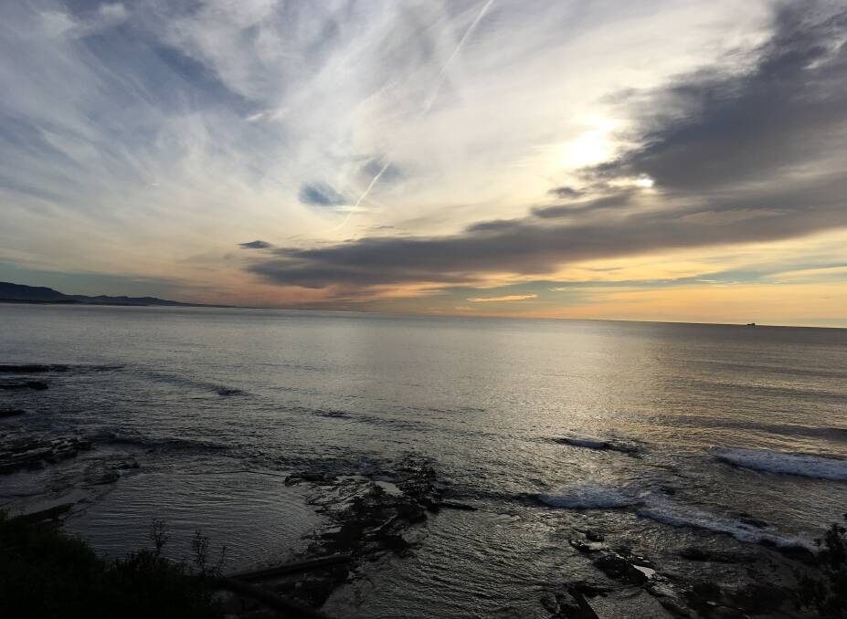 REDS AND GREYS: Over the Northern beaches by Peter Howe. Send us your photos to letters@illawarramercury.com.au or post to our Facebook page.