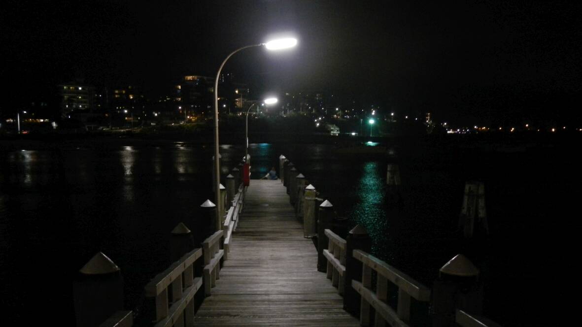 NIGHT LIGHT: The jetty at Wollongong harbour by Hans Haverkamp. Send your image to letters@illawarramercury.com.au or share it on our Facebook page.