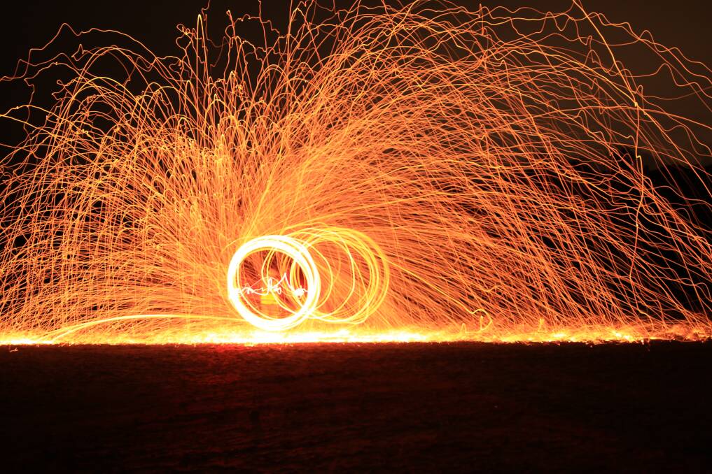 ON FIRE: Spinning steel wool at Bombo Quarry by Anita Pallas. Send your pictures to letters@illawarramercury.com.au or post to our Facebook page.