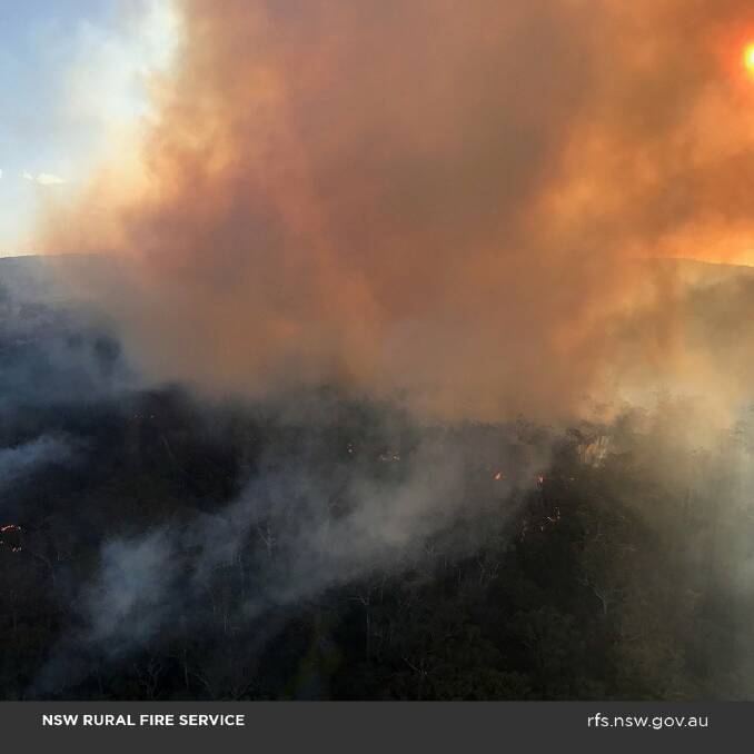 Photo of the fire taken from a NSW RFS aircraft. McKell Ave, Waterfall is closed to traffic. Picture: NSW RFS 