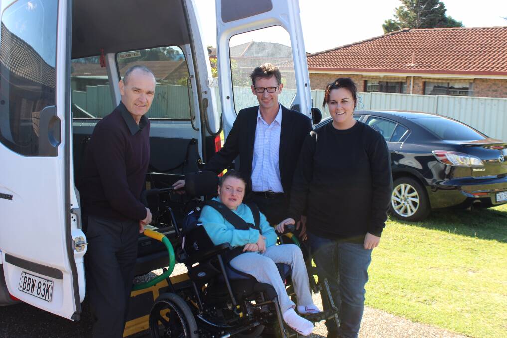CASH BOOST: Throsby MP, and Labor candidate for Whitlam, Stephen Jones with The Cram Foundation chief executive Gareth McKeen (left), client Elizabeth and care worker Hayley Condran during a funding announcement at the disability service's group home in Albion Park on Saturday.