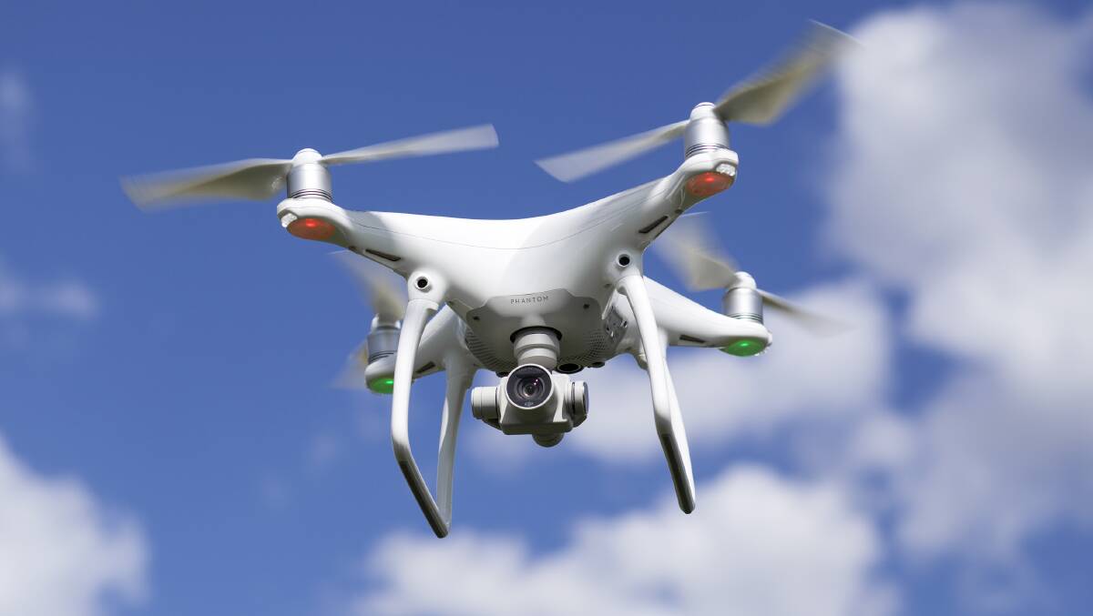 A DJI Phantom 4 unmanned aerial vehicle (UAV), similar to that to be used as part of the NSW government's three-month trial of the devices as shark-spotting tools. Picture: iStock