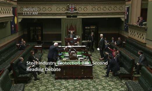 Kiama MP Gareth Ward (left), Member for Keira Ryan Park exchange words during the steel bill debate in the NSW Parliament's Legislative Assembly on Thursday.