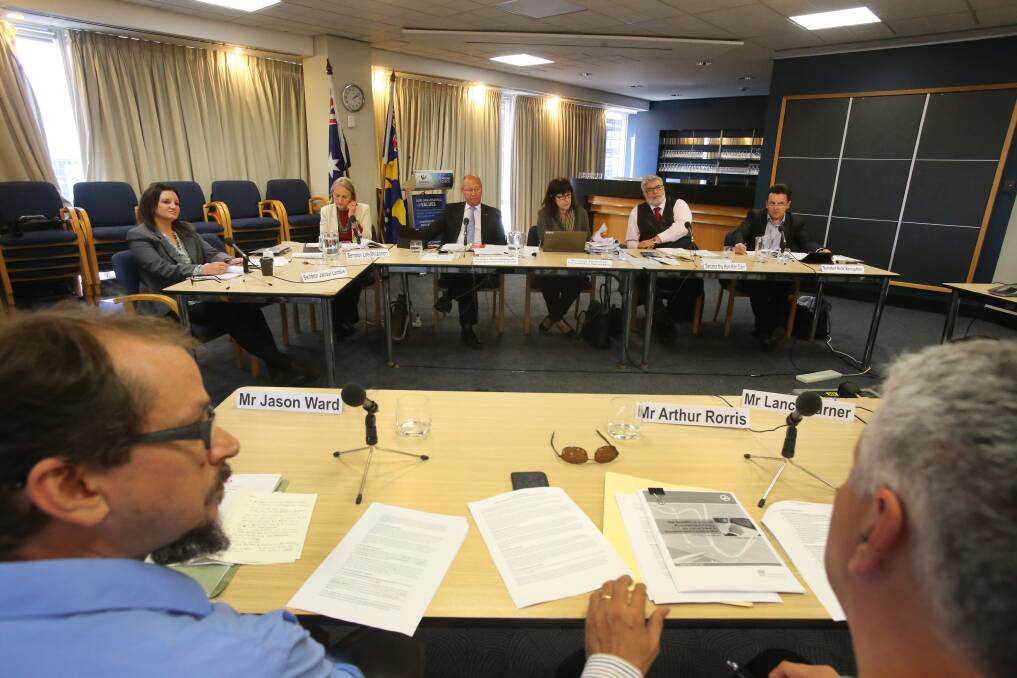 Jason Ward, from the International Transport Workers' Union and the South Coast Labour Council's Arthur Rorris address the Senate steel inquiry's hearing in Wollongong on Friday. Picture: Robert Peet