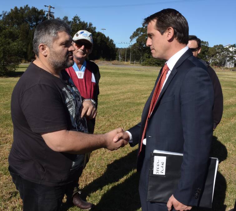 HELPING HAND: Port Kembla steelworker Sime Jovanovski thanks Labor's Illawarra spokesman Ryan Park for his party's steel industry commitment. Picture: Andrew Pearson