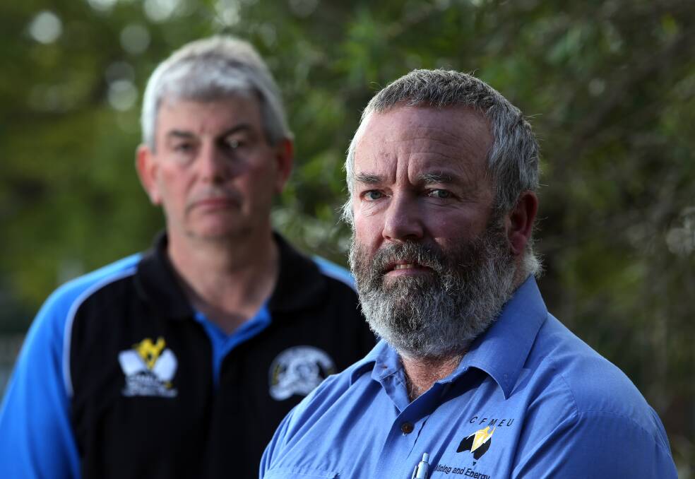 FIGHT CONTINUES: CFMEU members Lee Webb (left) and Dave McLachlan on April 19 - the day Mr McLachlan was sacked after an earlier protest at the Appin Colliery. The dismissal has sparked a national campaign. Picture: Robert Peet