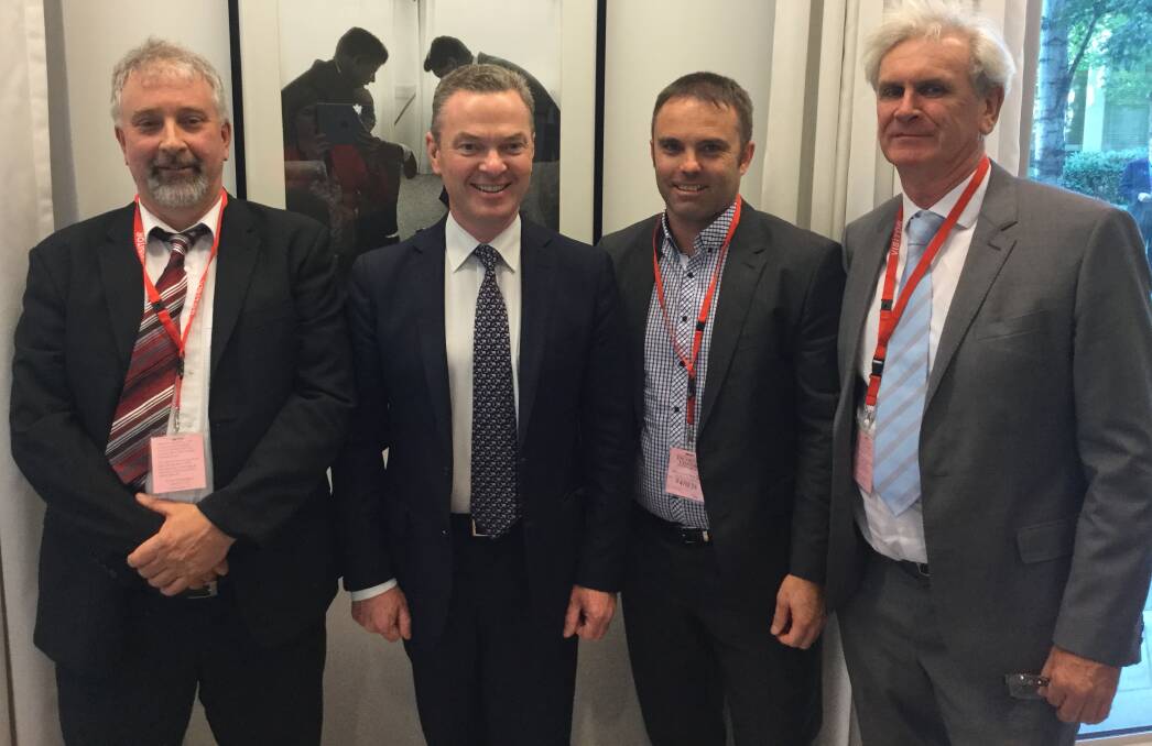 TALKS: Illawarra steel campaigners Ian Waters, Jason Leussink and John Doyle met federal industry minister Christopher Pyne (second from left) in Canberra on Thursday. 