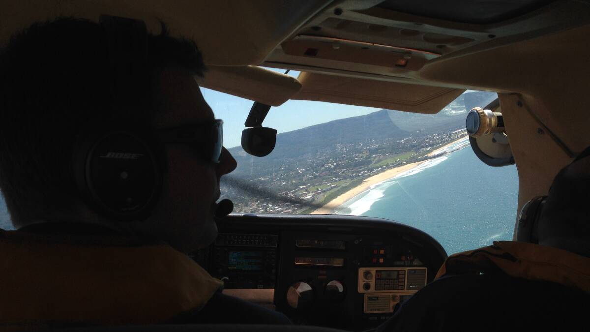 The Australian Aerial Patrol in the sky over Illawarra beaches in September last year. Pciture: Andrew Pearson