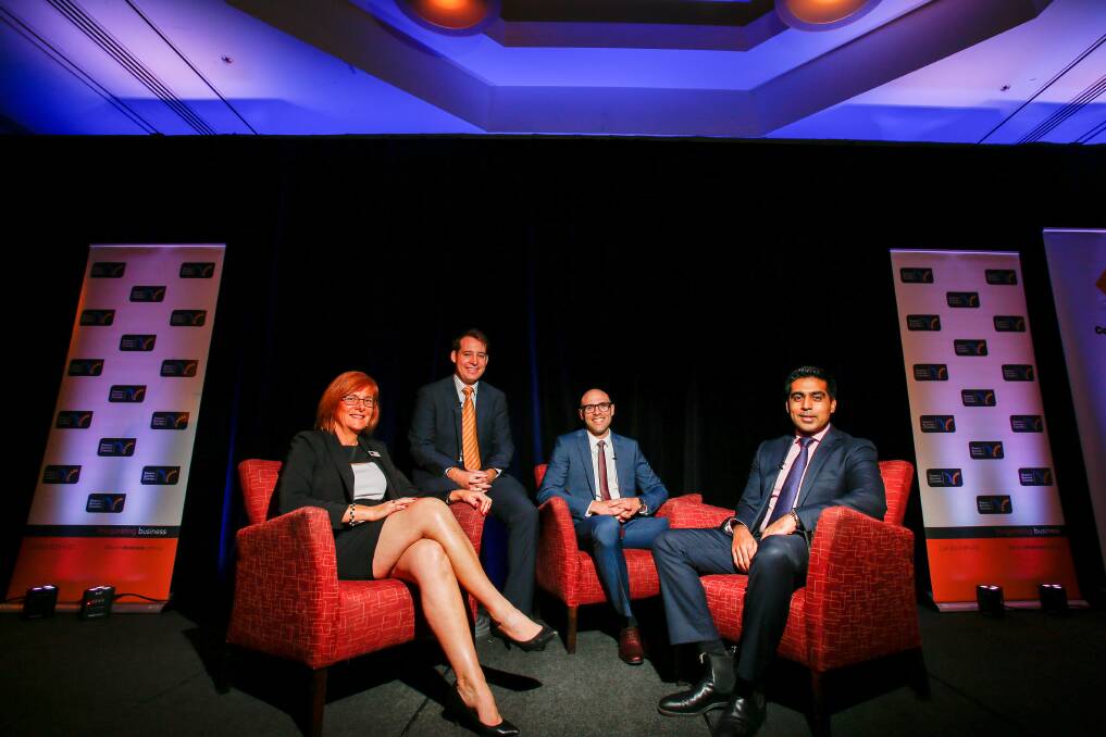 BUDGET TALKS: Debra Murphy (IBC) with budget lunch speakers Anthony Mason and David Apolo (KPMG) and Savanth Sebastian (Commonwealth Bank). Picture: Adam McLean
