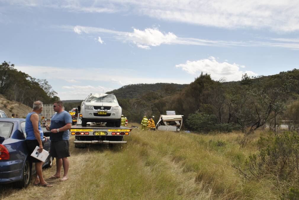 Passing motorists stopped to help Kaylene and Malcolm Booth after the accident on the Hume Highway. Picture: Southern Highland News