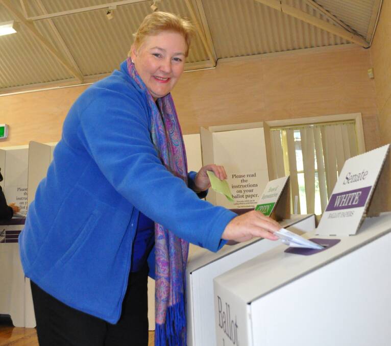 Gilmore MP Ann Sudmalis (Liberal) casts her vote at Batemans Bay Community Centre on Saturday. 