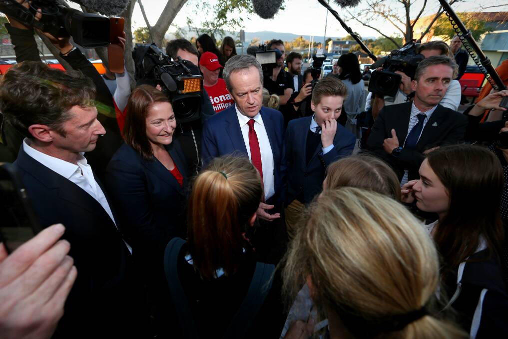 Labor's Fiona Phillips with Opposition Leader Bill Shorten in Nowra last week. Picture: Alex Ellinghausen