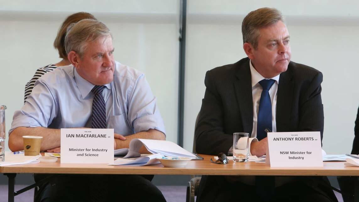 Anthony Roberts (right), the NSW Minister for Industry, with then federal Minister for Industry and Science Ian Macfarlane during a steel round-table in Wollongong in September. Picture: Robert Peet