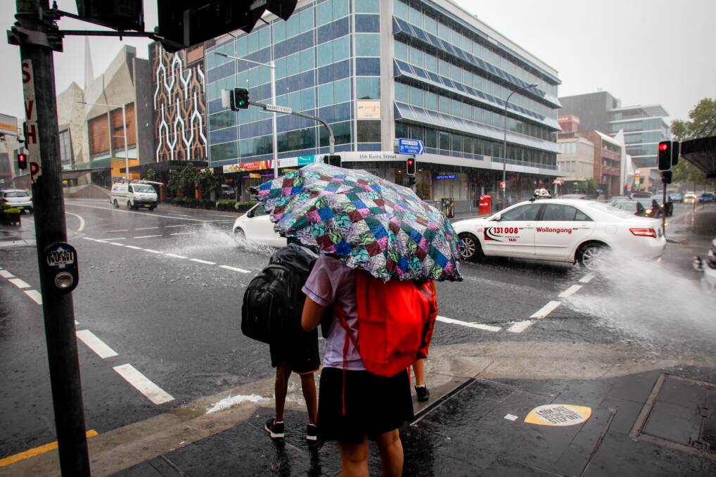 File image. A wet Keira Street in Wollongong during rain in March. Picture: Georgia Matts
