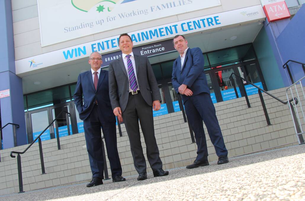 NSW Opposition Leader Luke Foley (left), Labor's Wollongong byelection candidate Paul Scully and Destination Wollongong general manager Mark Sleigh outside the WIN Entertainment Centre. Picture: Andrew Pearson