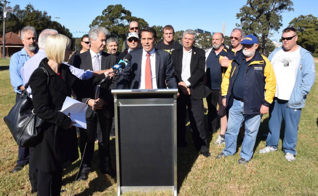Ryan Park is flanked by Labor's industry spokesman Adam Searle and steel industry supporters for Monday's announcement. Picture: Andrew Pearson