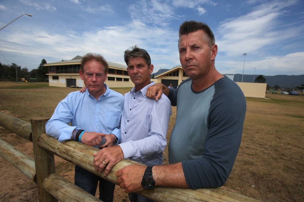 Ricki (left), Paul and Stephen Grimmer at the Fairy Meadow Surf Club in December. Picture: Robert Peet