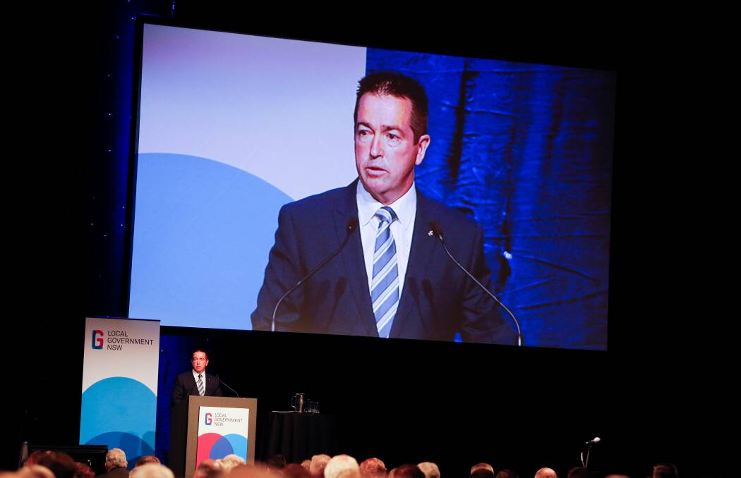 Local Government Minister Paul Toole listens during a question and answer session at the Local Government NSW conference. The two-day gathering was held at the WIN Entertainment Centre. Picture: Adam McLean
