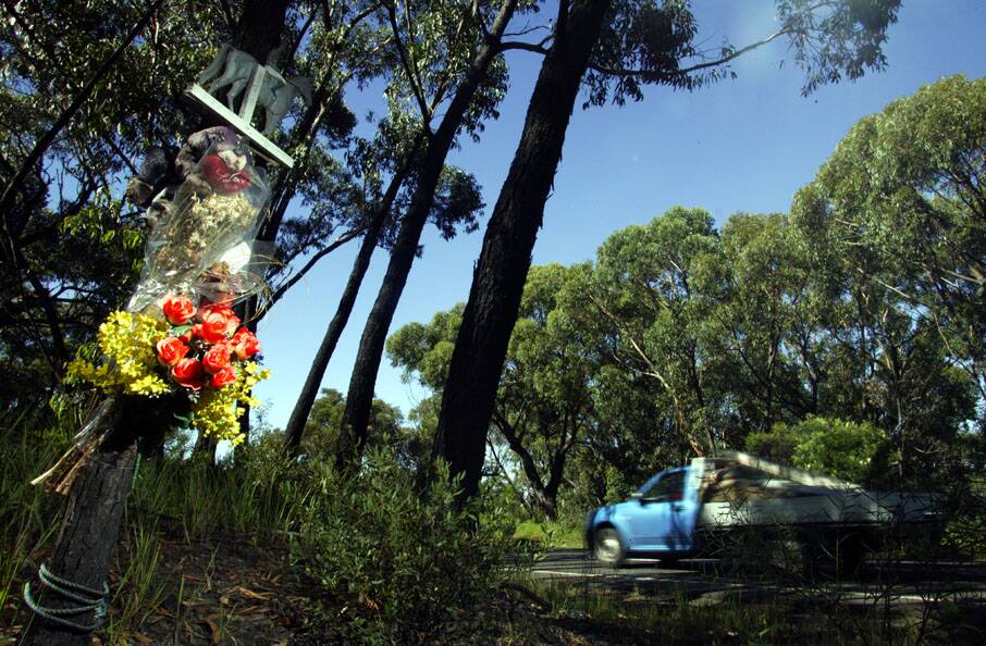 A roadside memorial on Appin Road, west of the Lodden River bridge, near Bulli Tops where Alex Garcia and Michael Madden died in an accident in 2004. Picture: Kirk Gilmour