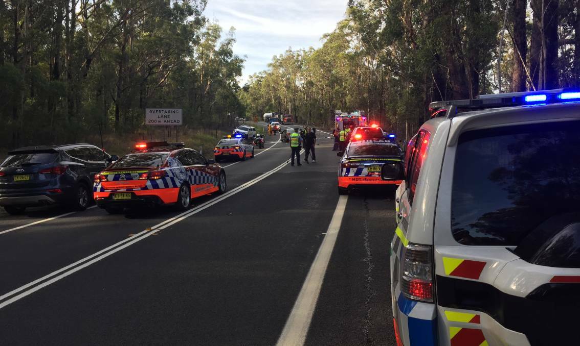 The crash scene on the Princes Highway at Jerrawangala where two people have died in a two-car accident. Picture: Damian McGill
