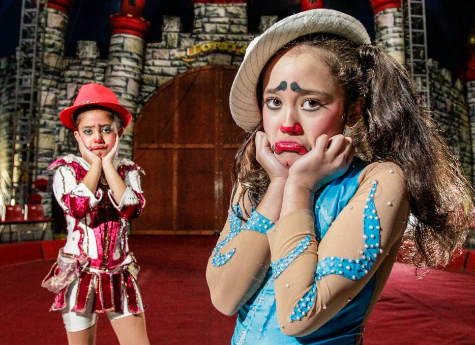 Great Moscow Circus performers Dubraska, 9, and Alaska, 7, Nicowsky are upset one of the circus' giant inflatable clowns was stolen from Dapto. Picture: Adam McLean
