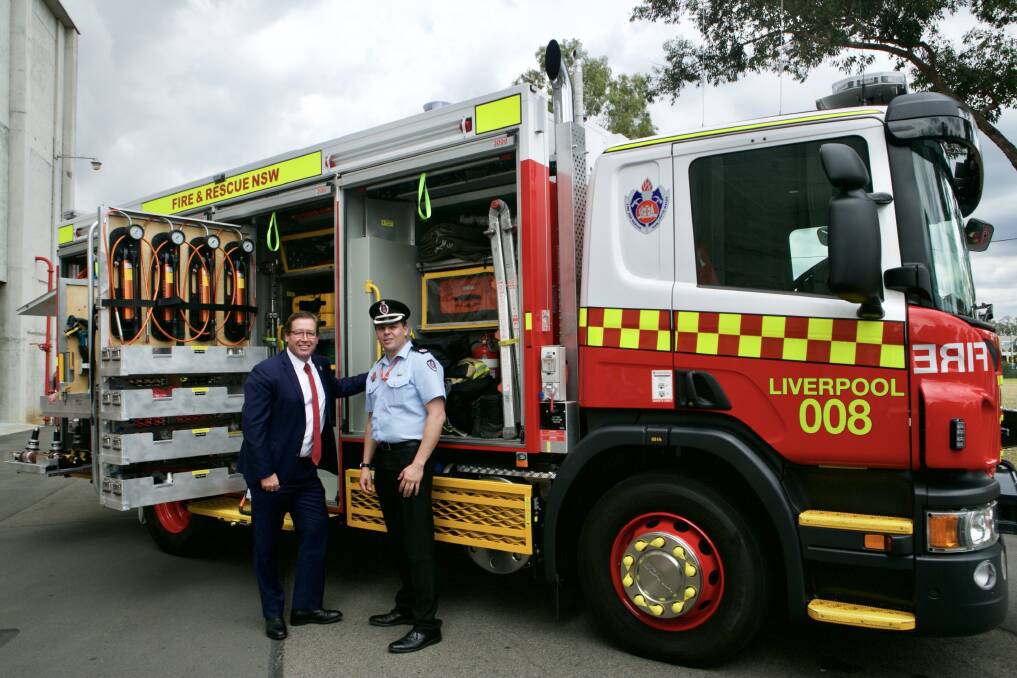 NSW Emergency Services Minister Troy Grant and Fire and Rescue NSW Assistant Commissioner Jeremy Fewtrell with one of the new technical rescue vehicles. Wollongong will receive one of the trucks later in 2018.