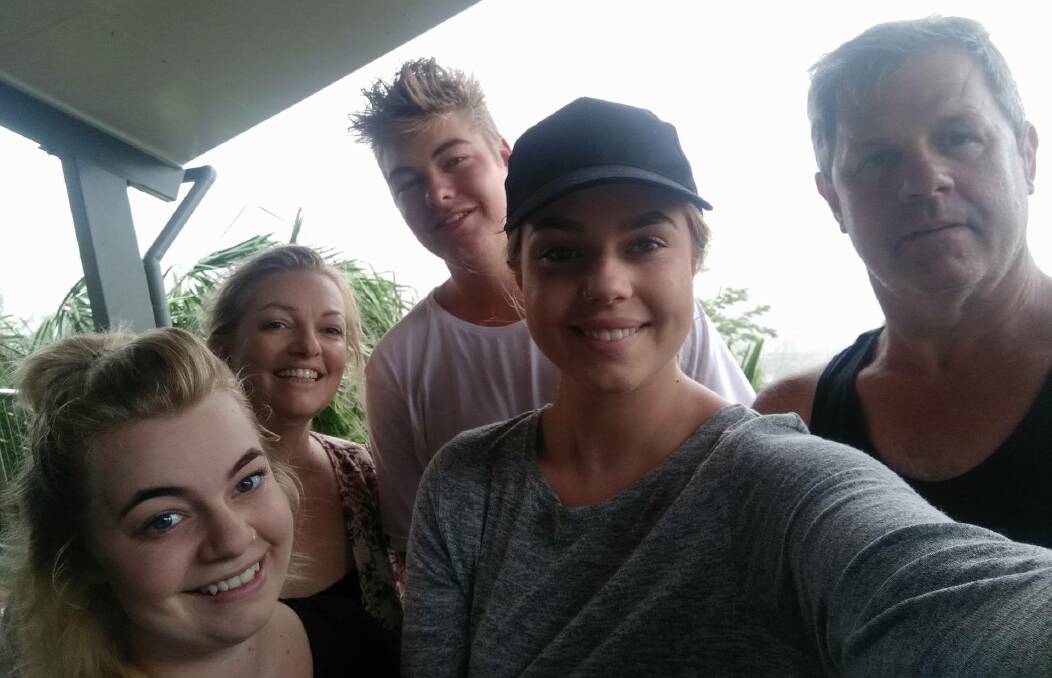Samantha Burnhams with her family on Hamilton Island. Picture: Supplied