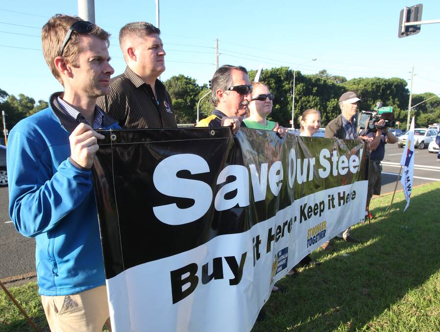 STRONG MESSAGE: "Save Our Steel" campaigners at Friday's community rally ahead of the Senate steel inquiry's Wollongong visit. Industry Minister Anthony Roberts says he wasn't invited to attend the inquiry. Picture: Robert Peet