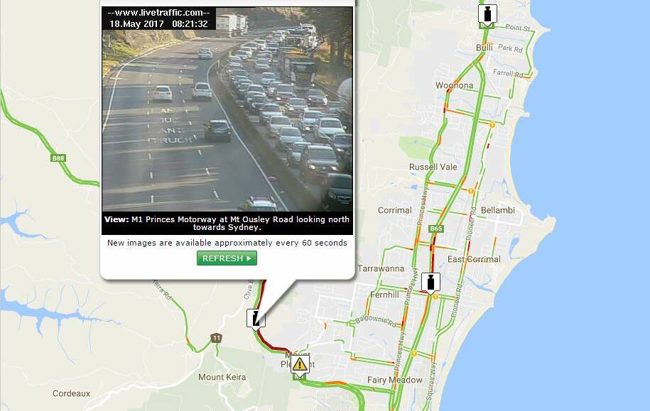 Multi-car crash causing M1 traffic delays