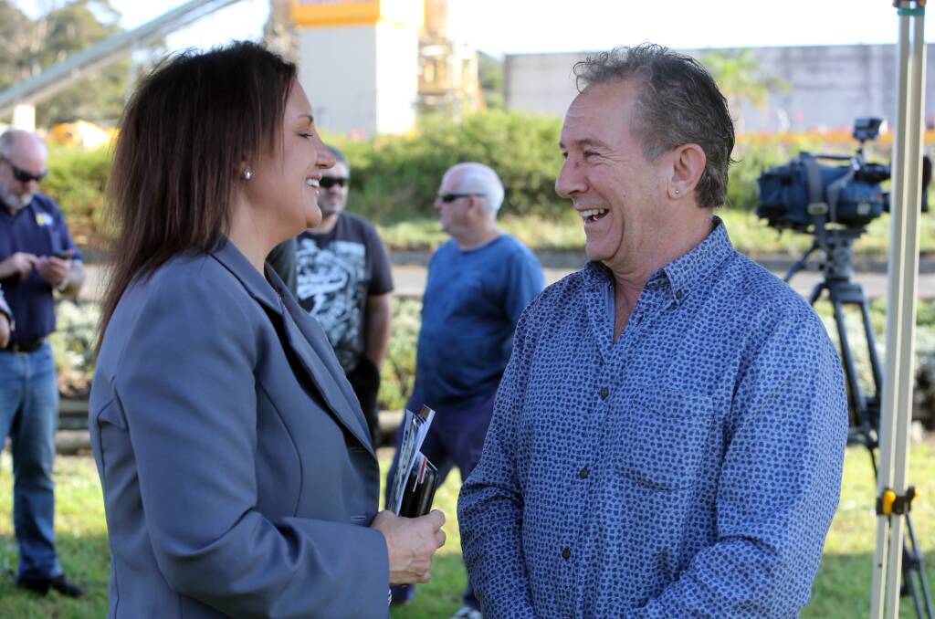 HEAR ME OUT: Port Kembla steelworker George Papaconstantinos and Independent Senator for Tasmania Jacqui Lambie share a laugh during Friday's "Save our Steel" rally, despite the serious nature of the event. Picture: Robert Peet
