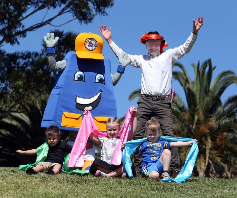 PICNIC TIME: Wollongong lord mayor Gordon Bradbery and Billy Backpack join Jake Tarlinton (left), Eloise Baulman and Ethan Fuller at MacCabe Park. Picture: Robert Peet