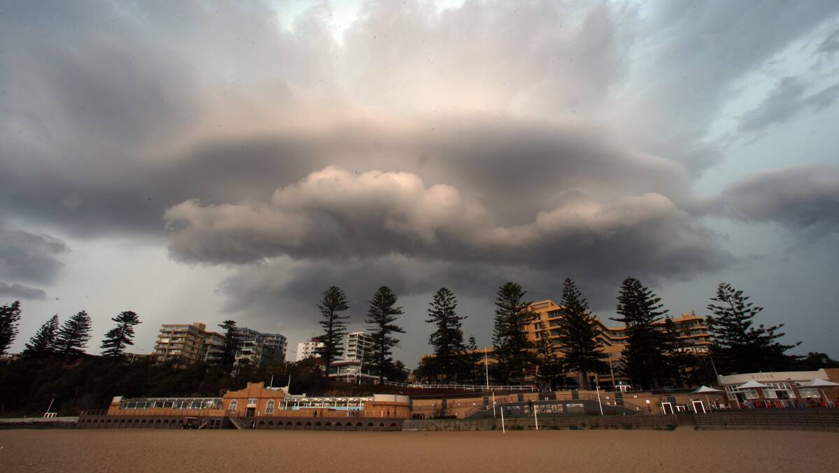 FILE PHOTO: A thunderstorm rolls in over North Wollongong Beach during January 2013. Picture: Adam McLean
