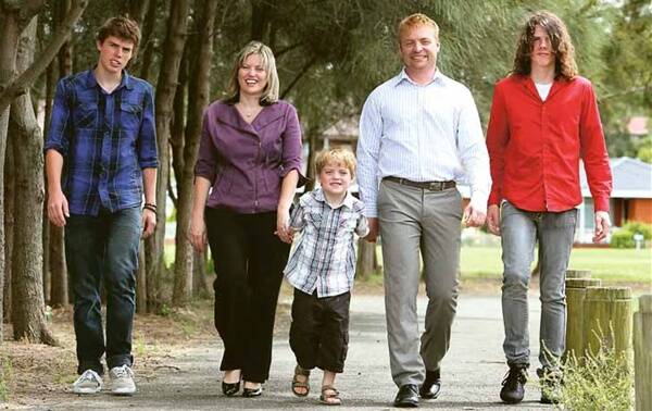 Angus, Lylea, Oliver, Andrew and Lachlan McMahon take a walk in the park on Friday. Ms McMahon stepped down as Member for Shellharbour at the weekend. Picture: KIRK GILMOUR