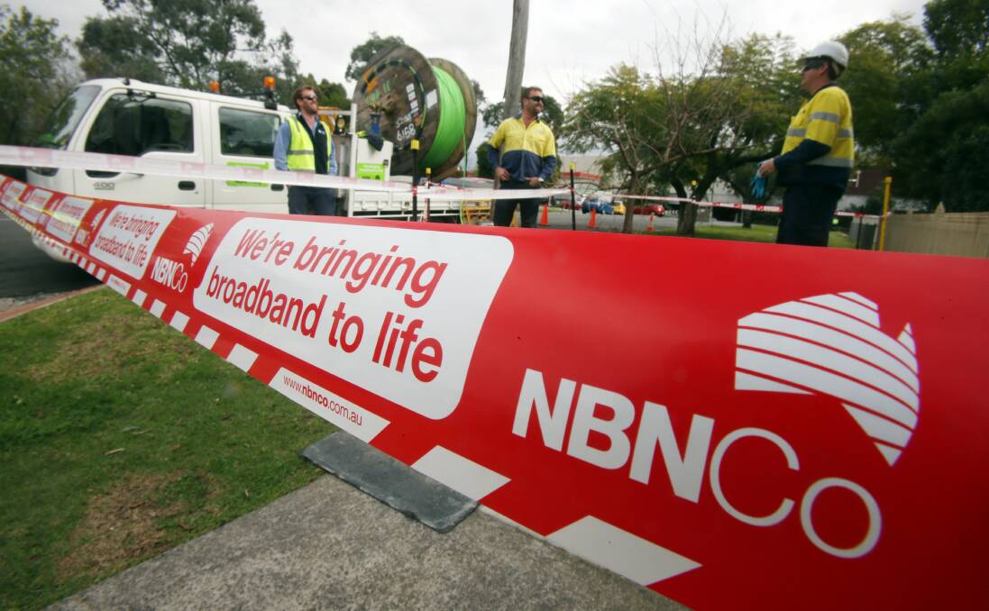 Workers begin to lay high-speed NBN cables in Dapto. Picture: ROBERT PEET