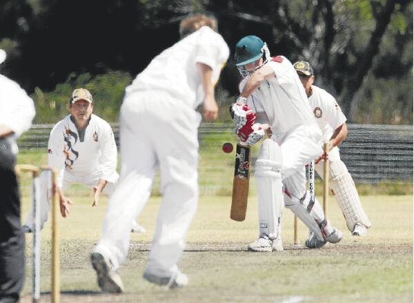 The Lake's Ryan Smith bowls to Rail batsman Simon Bartlett at Howard Fowles Oval. Pictures: GREG TOTMAN