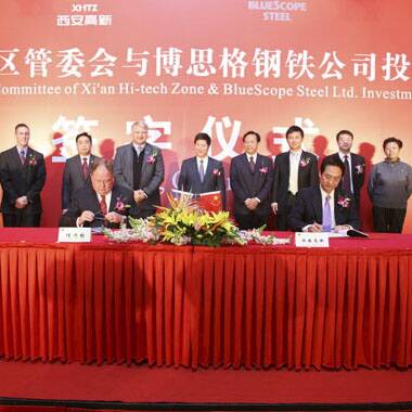BlueScope Steel representatives  signing an agreement  to set up a factory in the   Xi’an Hi-Tech Industries Development Zone.  Picture: RIGHTSITE.ASIA