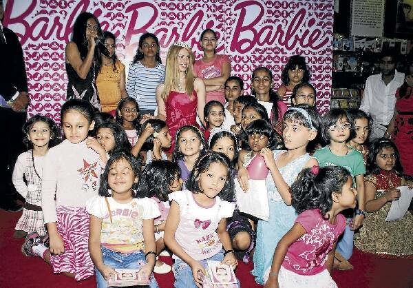 Elise Jensen, of Mt Kembla, spent December touring India as Barbie for the icon's 50th anniversary celebrations.