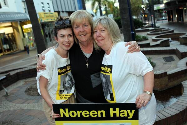 Noreen Hay celebrates her cliffhanger win with niece Annie Herlihy (left) and sister Eileen Prestage, both visiting from Britain. Picture: ANDY ZAKELI