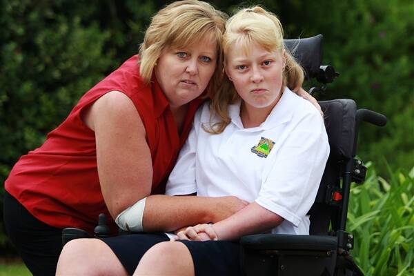 Mecenzi and mum Toni Howard who were victims of the disabled bus debacle on Monday.Picture: ORLANDO CHIODO