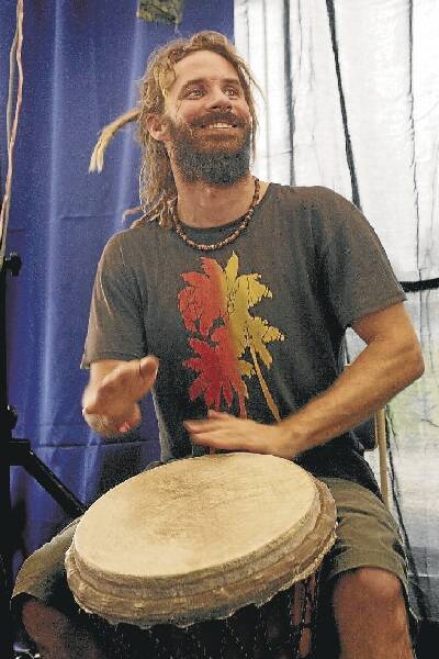 Percussionist Damien Stirling beats a bongo during the festival's showground lunch. Pictures: KIRK GILMOUR