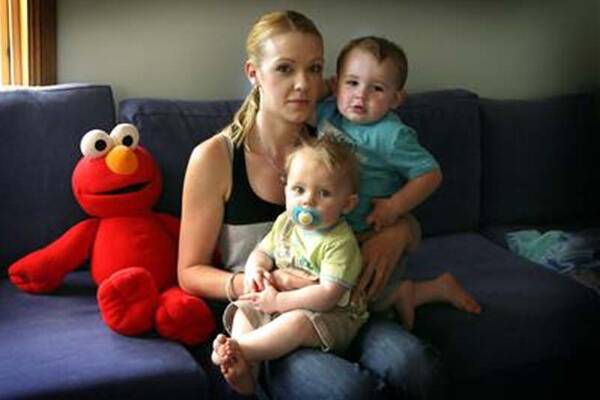 Sarah Tilling and her two sons Jackson, 10 months, and Bailey, 2, who will receive less than half their toys on Christmas Day. Picture: SYLVIA LIBER