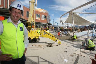 Stockland development manager Tim Beattie in the City Square, which features alfresco dining from eateries such as Cold Rock, The Coffee Club, Max Brenner, Sushi Bay and Ribs and Rumps. 