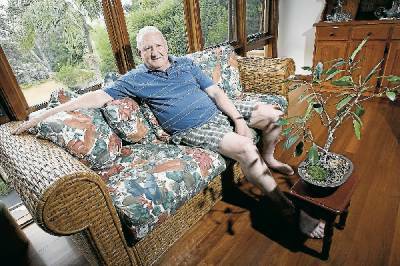 A relaxed - but angry - former Wollongong lord mayor Alex Darling at home yesterday. Picture: KEN ROBERTSON
