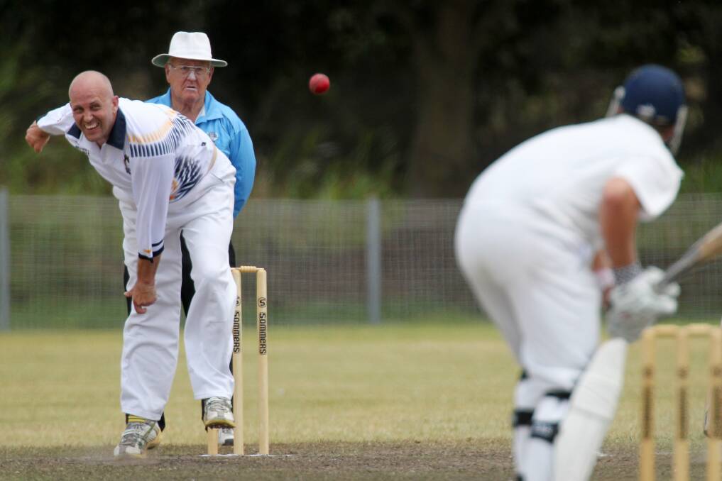 Lake Illawarra's Brian Smith bowls to Albion Park skipper Adam Coughlan on the opening day of their clash. Picture: GREG TOTMAN