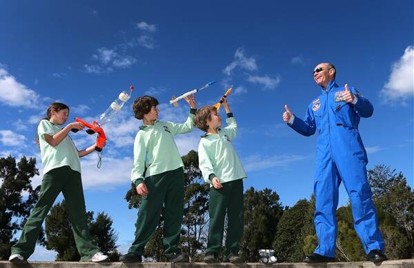 Mt Ousley Public School teacher Neil Bramsen was one of just 15 teachers in the world selected to attend a space camp at NASA's Alabama rocket base in the United States and is now imparting his science knowledge to his students. Picture: KIRK GILMOUR