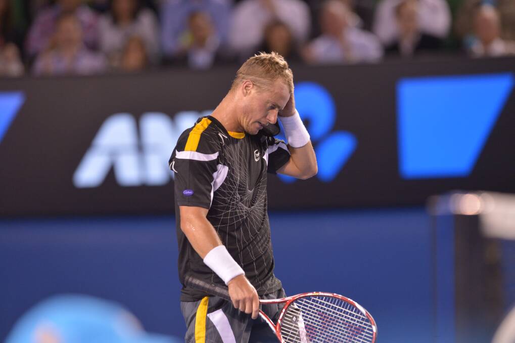 A dejected Lleyton Hewitt after his loss to Janko Tipsarevic. Picture: JOE ARMAO