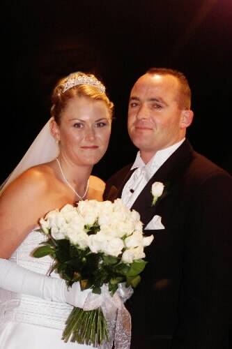 Woonona man Stephen Holmes with his wife Angela on their wedding day.