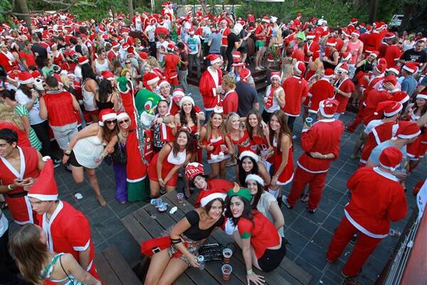  Some of the thousands of revellers who gathered at the North Gong Hotel last year for the start of the annual Santa Claus Pub Crawl. The event is now world rated.